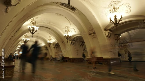 Dynamic hyperlapse in Moscow metro subway famous Soviet architecture lot of people hurry go fast crowd in different directions platform candelabra stucco decoration. Overpopulation metropolis. Gimbal
