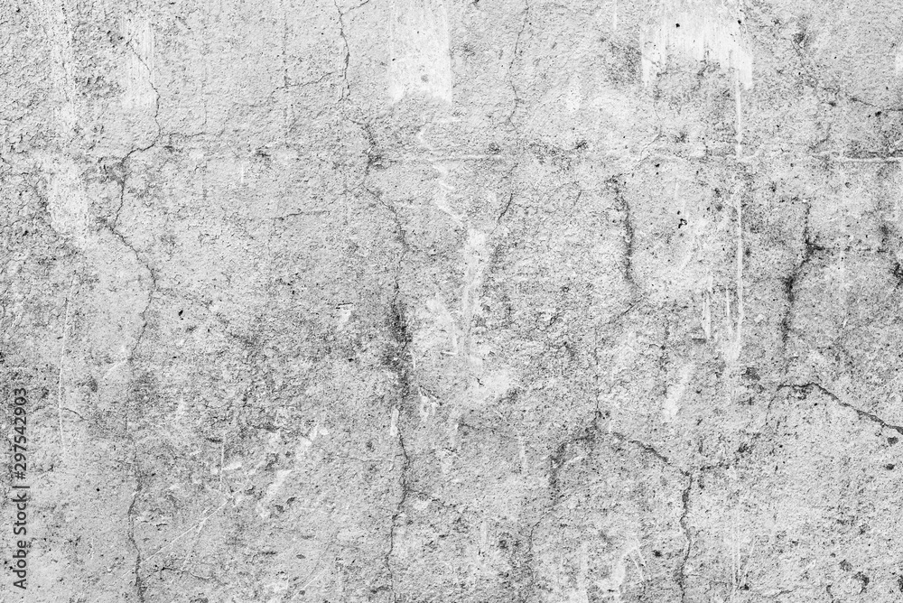 Texture of a concrete wall with cracks and scratches which can be used as a background