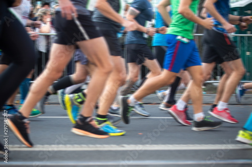 Marathon runners, running on the city road.