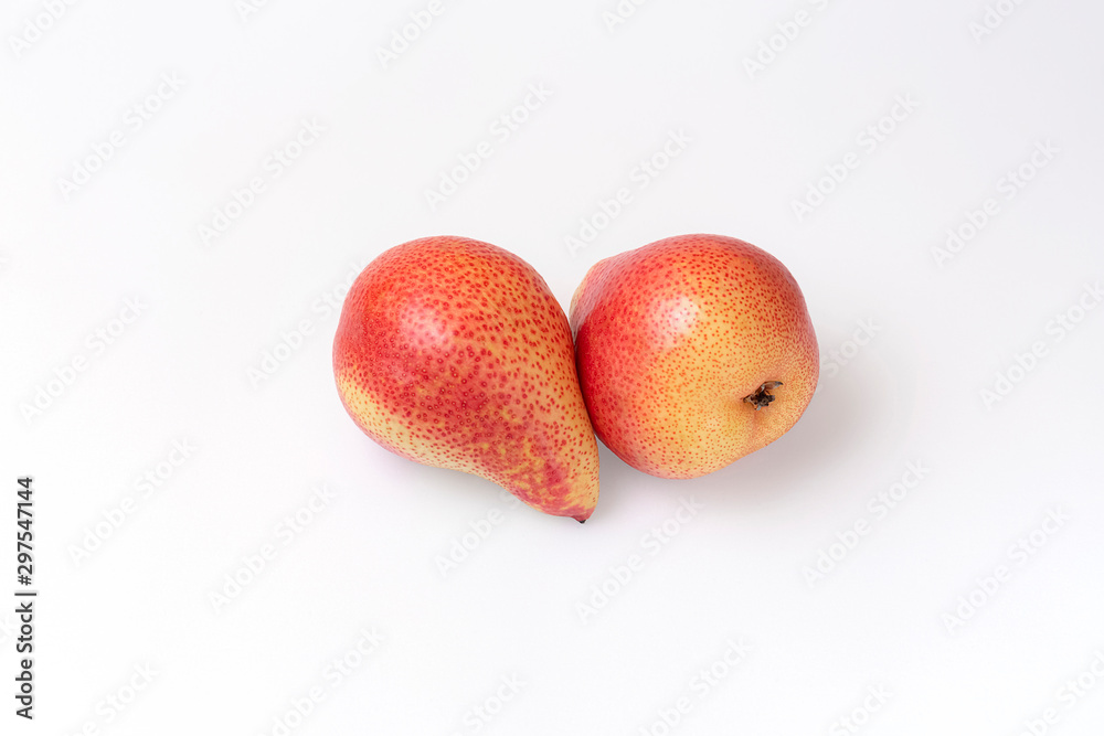 Two red-yellow pear on a light background Two red-yellow pear on a light background