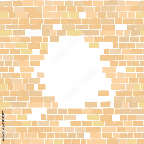 Ancient sandy colored brick wall with a circular gap.