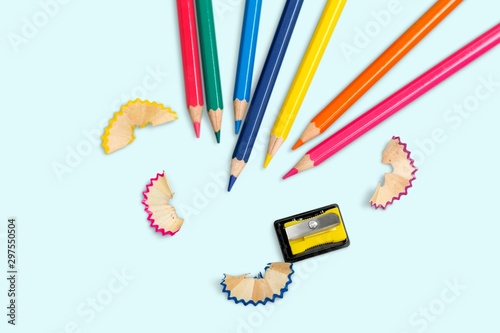 Colorful school supplies on white background