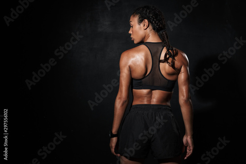 Image from back of athletic african american woman in sportswear