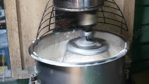 Electric mixer creating pastry dough photo