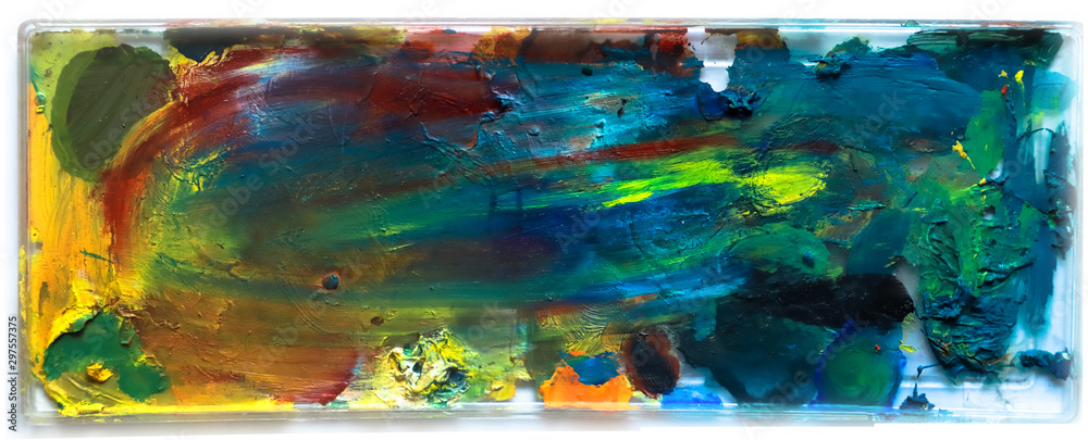 Photo of a rectangular artist’s palette with the remains of oil paints.
