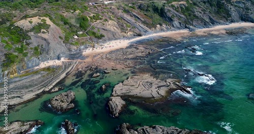 Aerial view of the Carreagem Beach and the rock formations at the in Aljezur, Algarve; 