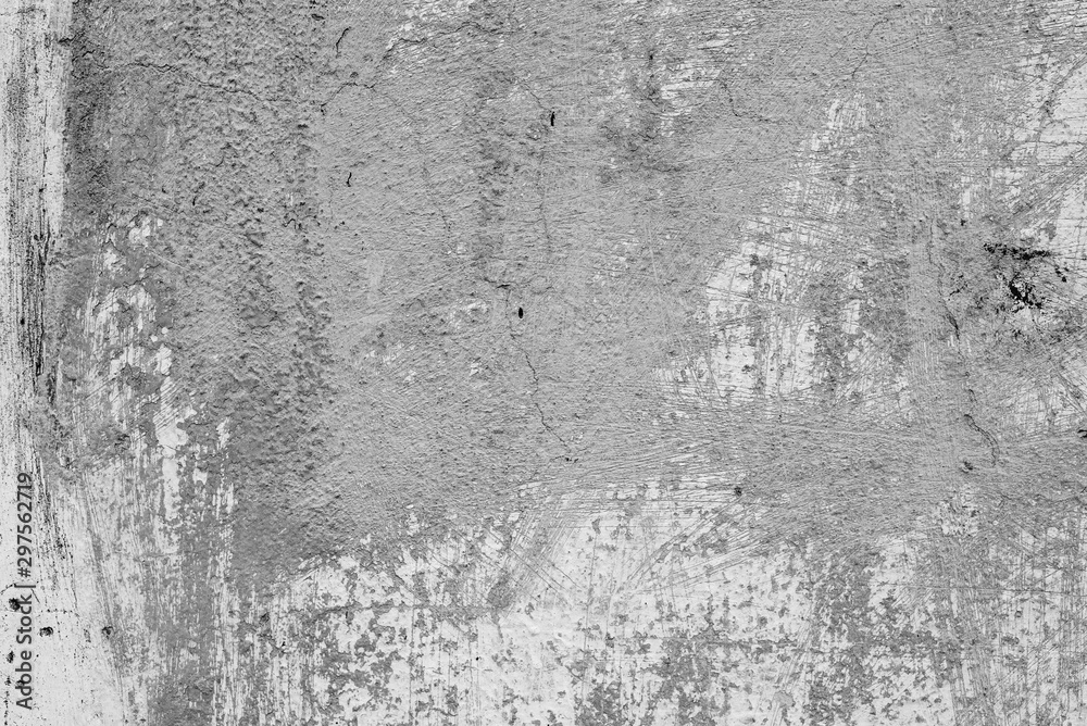 Fototapeta premium Texture of a concrete wall with cracks and scratches which can be used as a background
