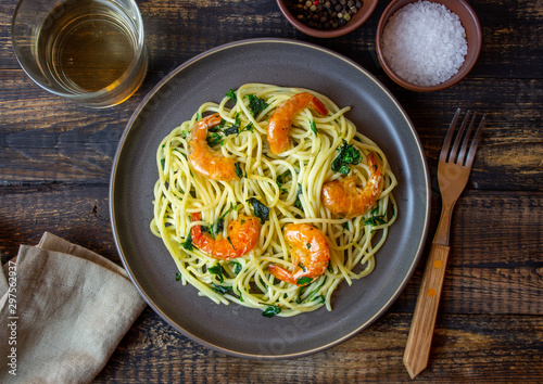 Italian pasta spaghetti with shrimps. Healty eating. Recipes. National cuisine.