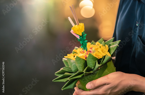 People holding Krathong, Loy Krathong is new year festival celebrated annually in Thailand. photo