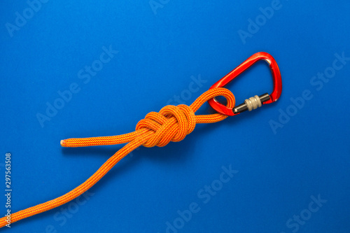 Photography Carabiner and knot from a climbing rope.