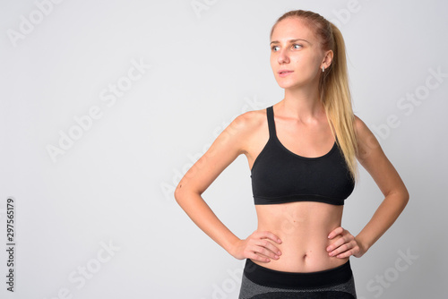 Portrait of young blonde woman thinking ready for gym