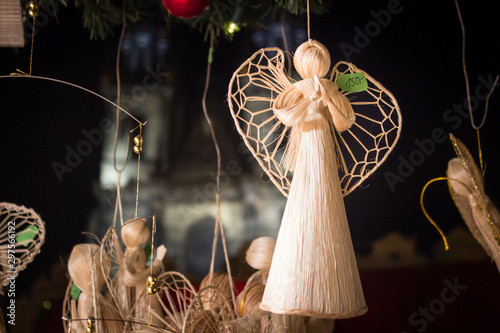Knitted angel for Christmas tree decoration. Christmas market Christmas concept.