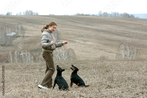 The girl with two dogs © Vladimir Konjushenko