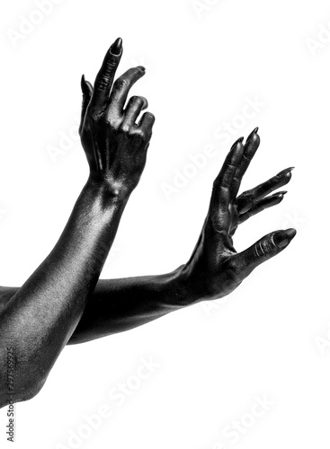 Black painted hands with long nails isolated on white background