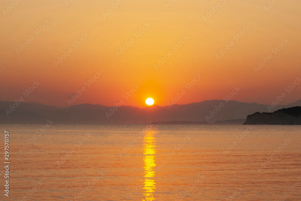Sunset on the greek coast of the mediterranean sea Sunset on the greek coast of the mediterranean sea