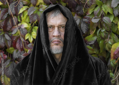 monk in a black hood