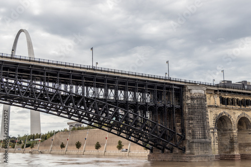 The Gateway Arch and Ead's Bridge spanning the Mississippi River photo