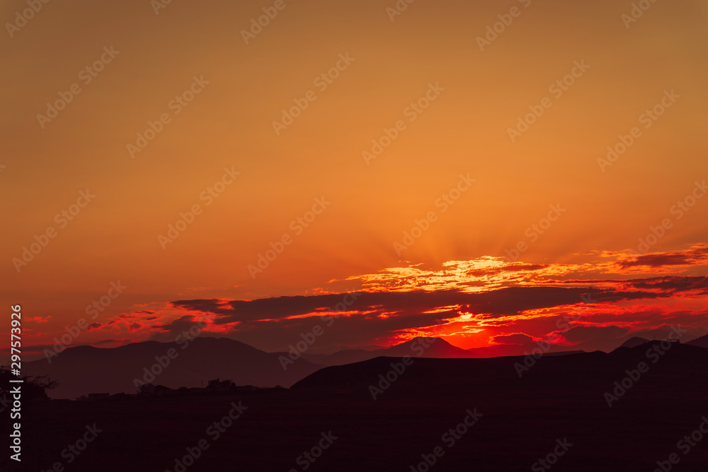 Red golden sunset in the flat terrain