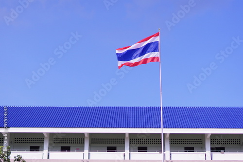 american flag in front of building