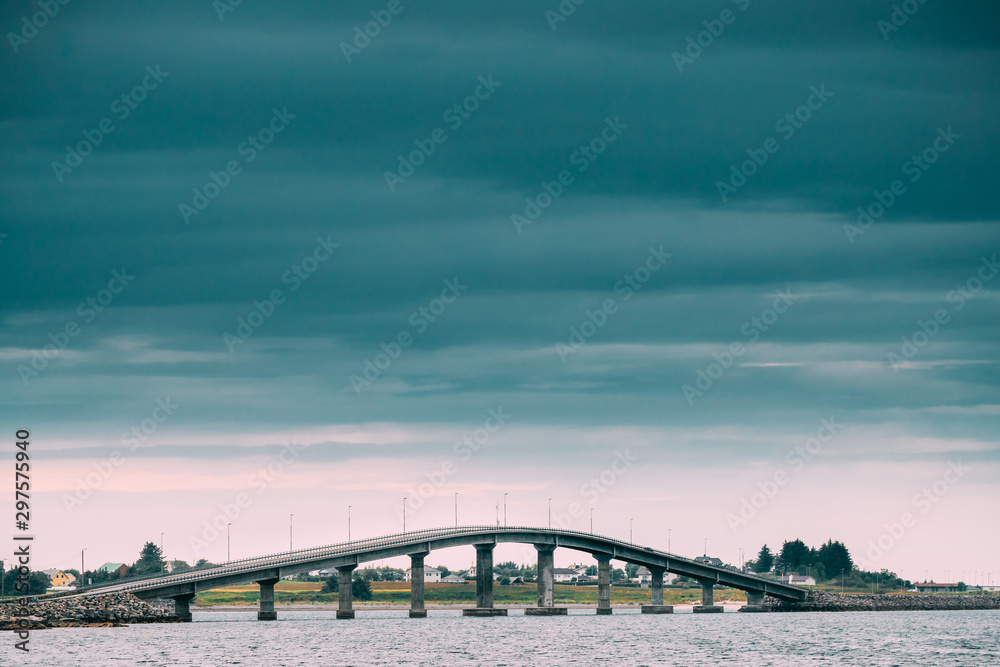 Naklejka premium Giskebrua, Giske, Norway. View Of Bridge Between Islands Near Alesund. Giske Is An Island Municipality In More Og Romsdal County, Norway