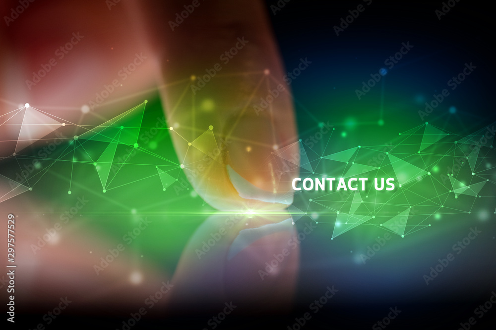 Finger touching tablet with CONTACT US inscription, business concept Finger touching tablet with CONTACT US inscription, business concept
