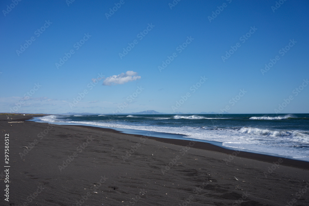 Seascape with volcanic beach on the Kamchatka Peninsula. Seascape with volcanic beach on the Kamchatka Peninsula.