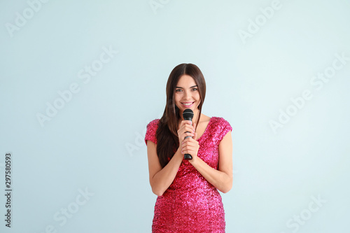 Beautiful young female sing...