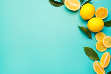 Ripe lemons on color background