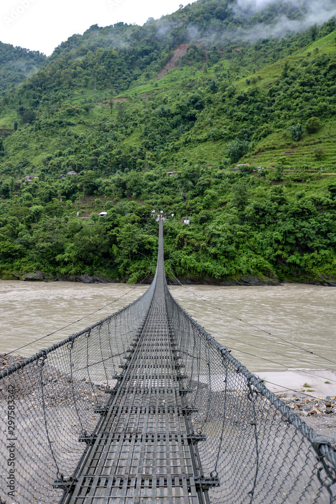 Suspension bridge on the banks of the Seti Gandaki river in Nepal