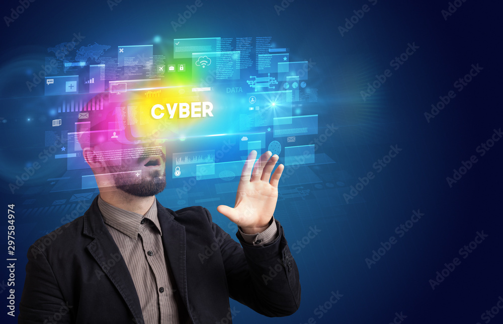 Obraz premium Businessman looking through Virtual Reality glasses with CYBER inscription, innovative security concept