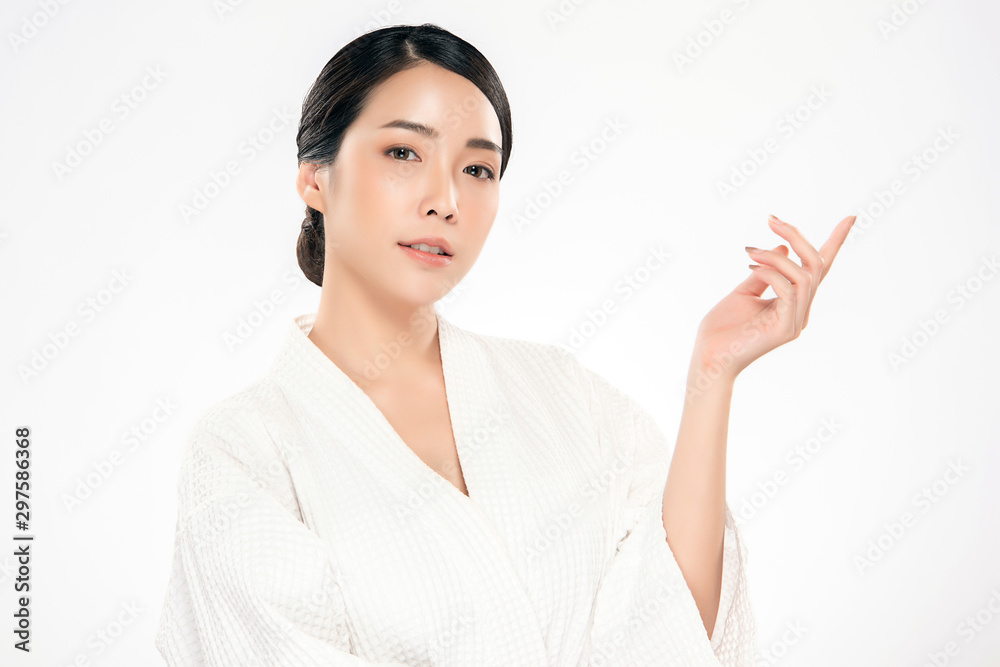 Beautiful young Asian young woman open hand palm for display cosmetics product cheerful. with healthy skin,isolated on white background,Beauty Cosmetics Concept Beautiful young Asian young woman open hand palm for display cosmetics product cheerful. with healthy skin,isolated on white background,Beauty Cosmetics Concept