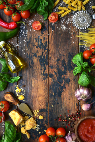 Culinary background with traditional ingredients of italian cuisine. Top view with copy space.