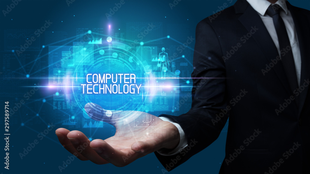 Man hand holding COMPUTER TECHNOLOGY inscription, technology concept