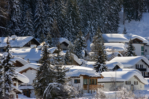 Snow covered houses at Davos during winter, Switzerland, EU, photo