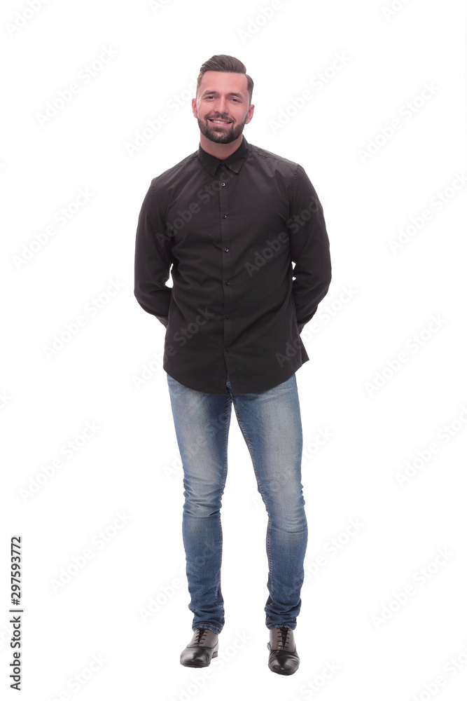 in full growth. a young man in jeans and a black shirt. in full growth. a young man in jeans and a black shirt.