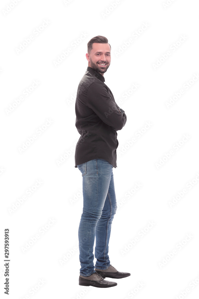 side view. modern young man in jeans side view. modern young man in jeans