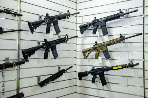 Gun wall rack with rifles