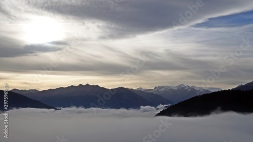 autumn in the mountain with fog in the valley