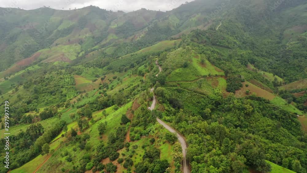 Aerial view of the winding mountain roads and beautiful roads suitable for holiday driving in Nan, Thailand. Aerial view of the winding mountain roads and beautiful roads suitable for holiday driving in Nan, Thailand.