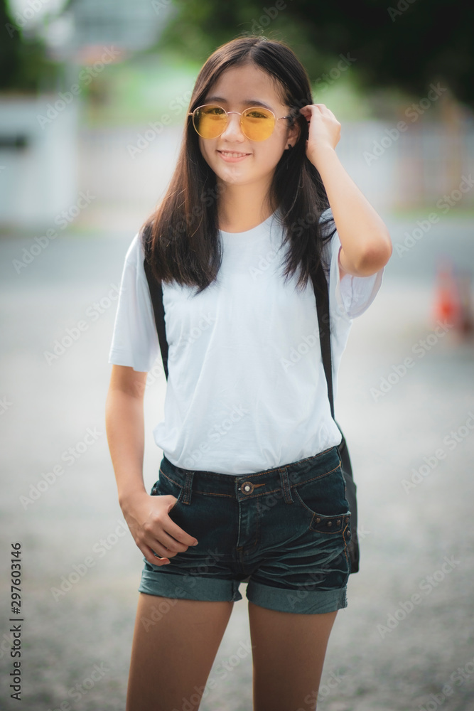 asian teenager toothy smiling face happiness standing outdoor