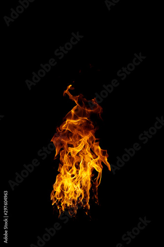 real and hot flames are burning on a black background. © Prot