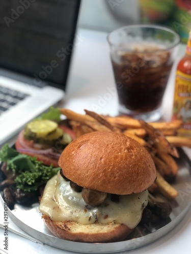 burger with fries and beer