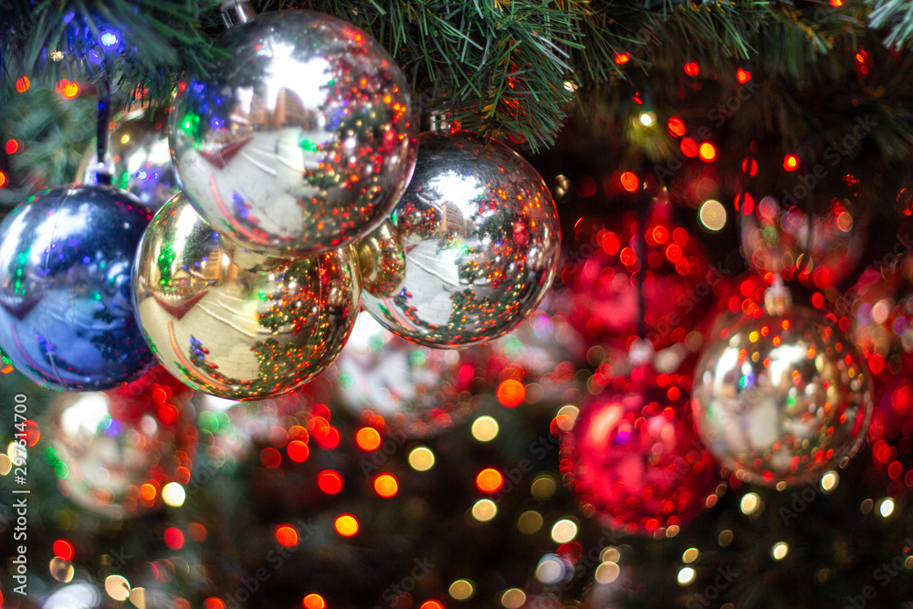 Christmas ornaments on the Christmas tree with bokeh background Christmas ornaments on the Christmas tree with bokeh background
