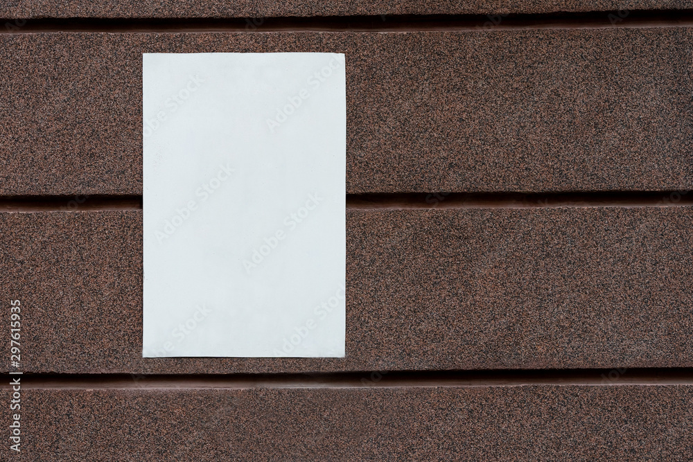 Fototapeta premium white blank signboard blank for your text on mosaic marble plaster wall. copy space
