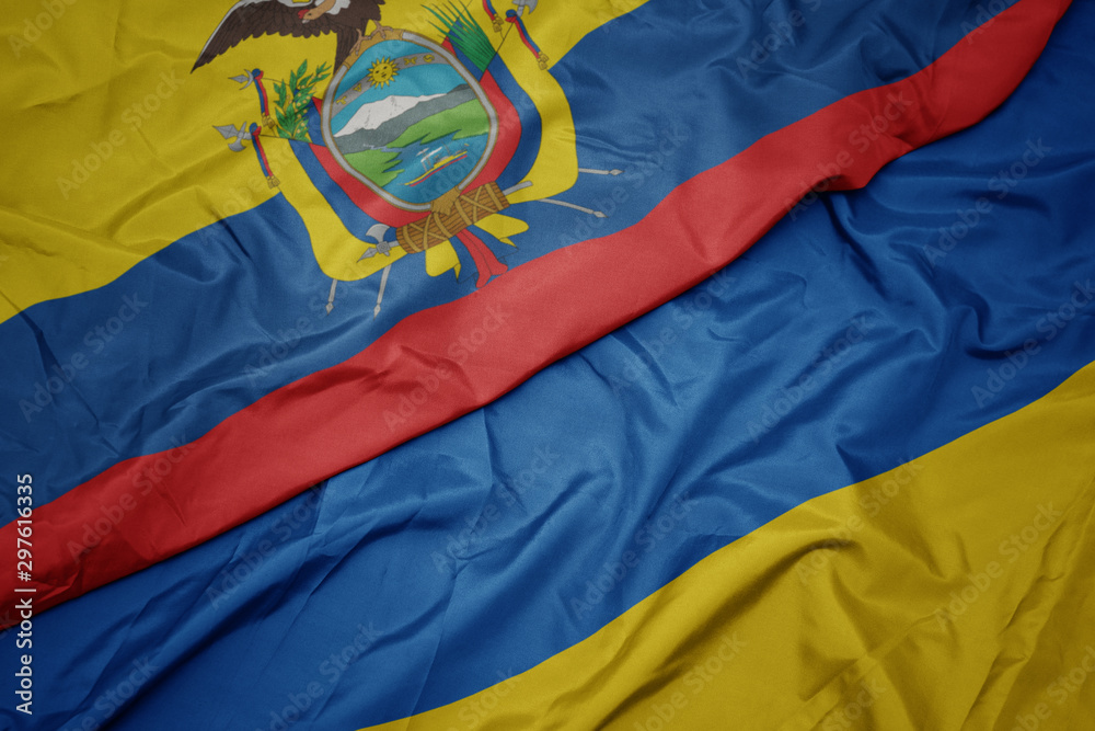 waving colorful flag of ukraine and national flag of ecuador.