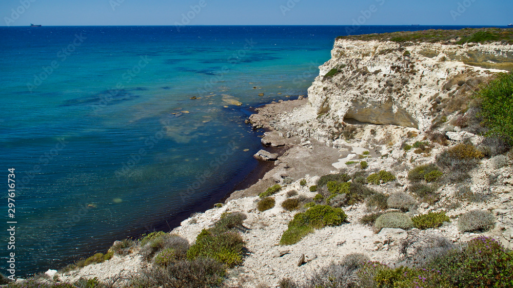 Aegean sea coast and sandy coves and paths