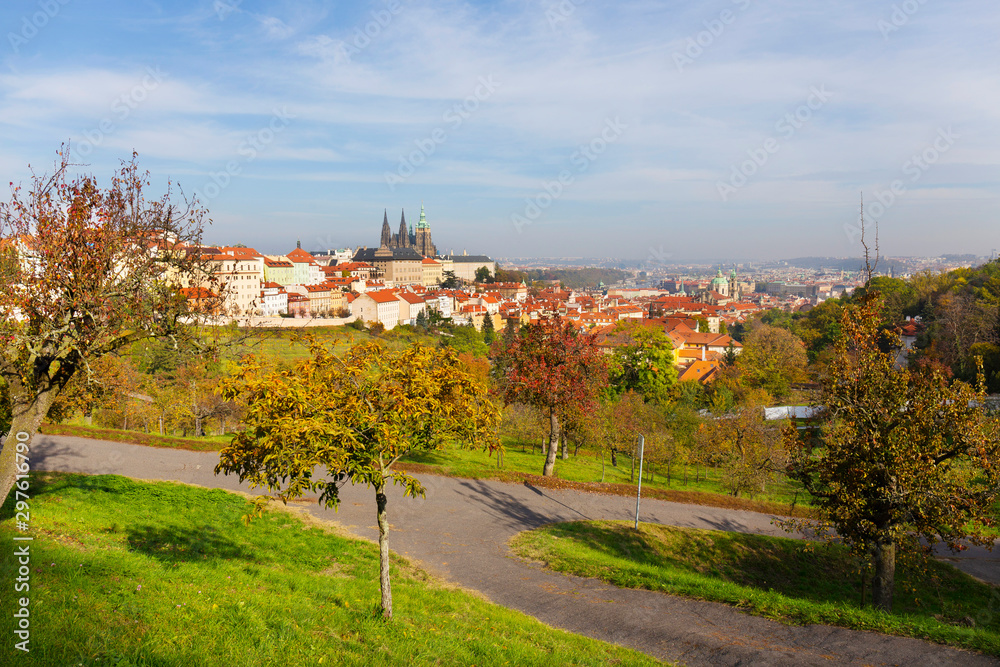 Autumn Prague City with gothic Castle and colorful Nature and Trees from the Hill Petrin, Czech Republic