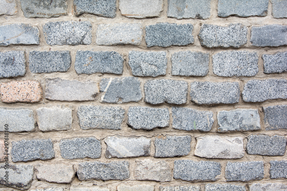 muro de adoquines de piedra gris