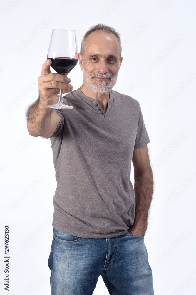 man with a coup of red wine on white background man with a coup of red wine on white background