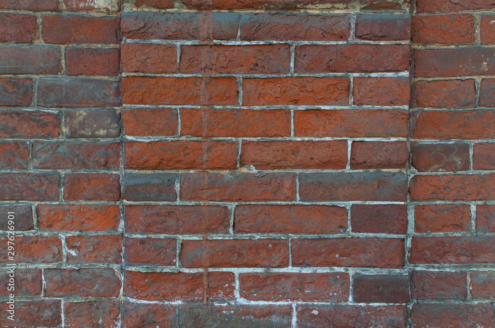 Fototapeta premium fragment of dirty brick wall